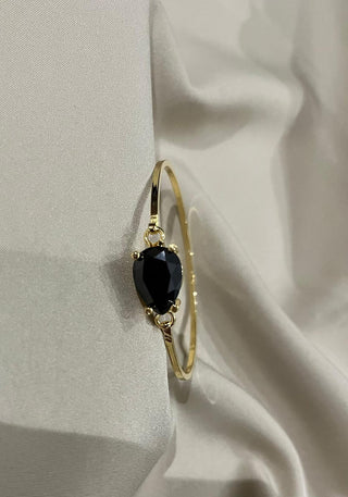 A Y R A black clasp bangle