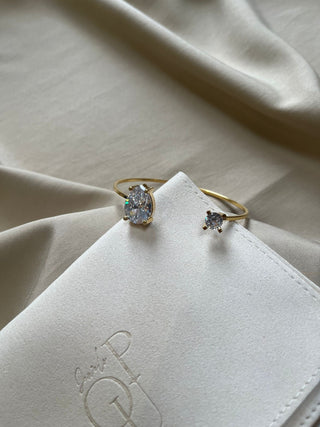 A Y R A Bangle in clear stone