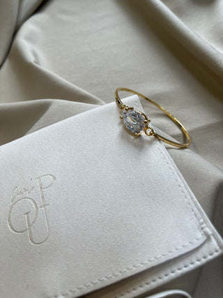 A Y R A single stone bangle in clear stone